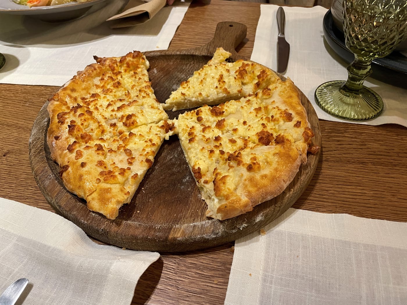 Georgian khachapuri, a hot cheese-filled bread, at an Armenian-Georgian restaurant in Riga