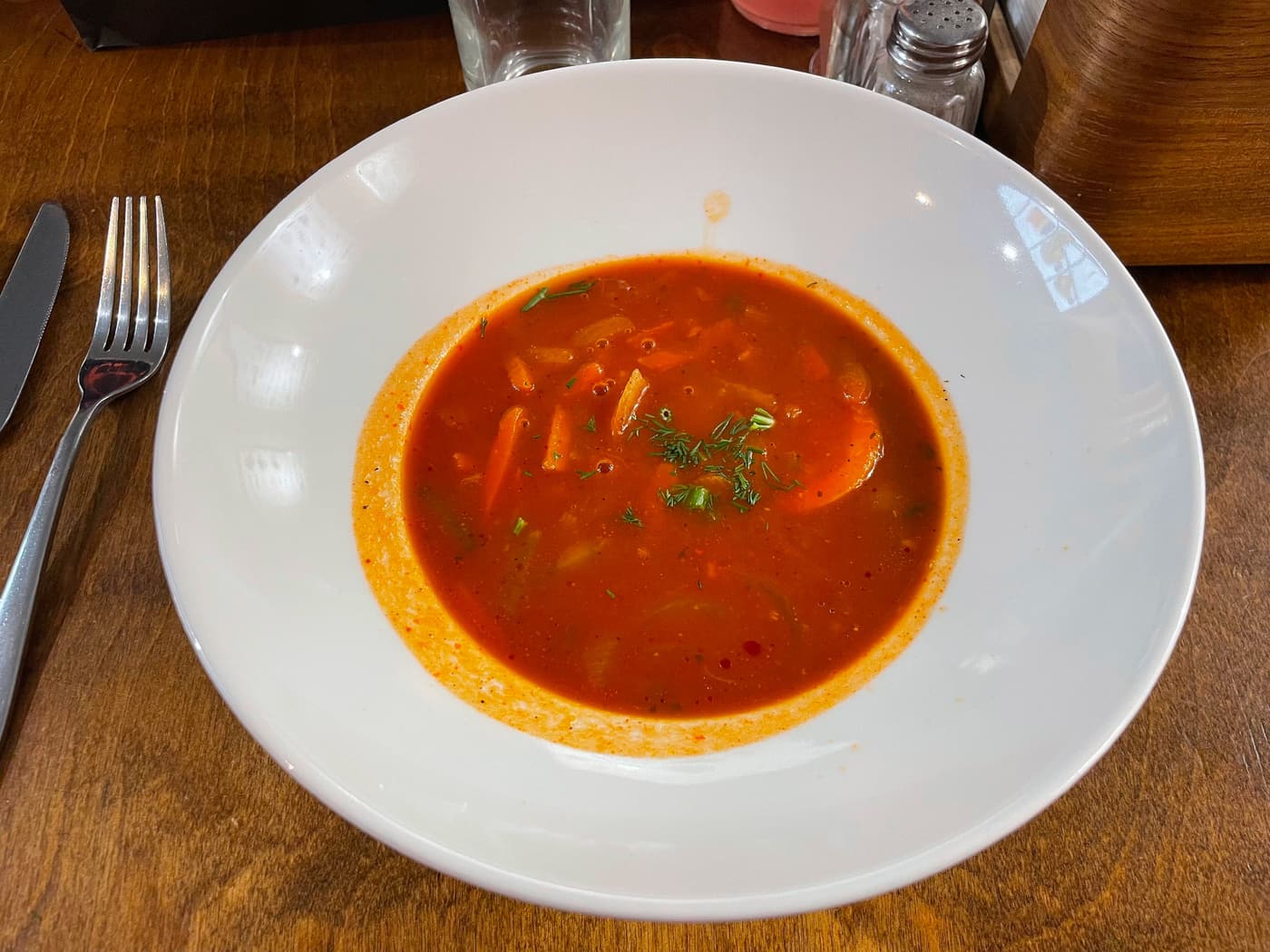 A bowl of solyanka, a tangy Eastern European soup, at a Riga restaurant