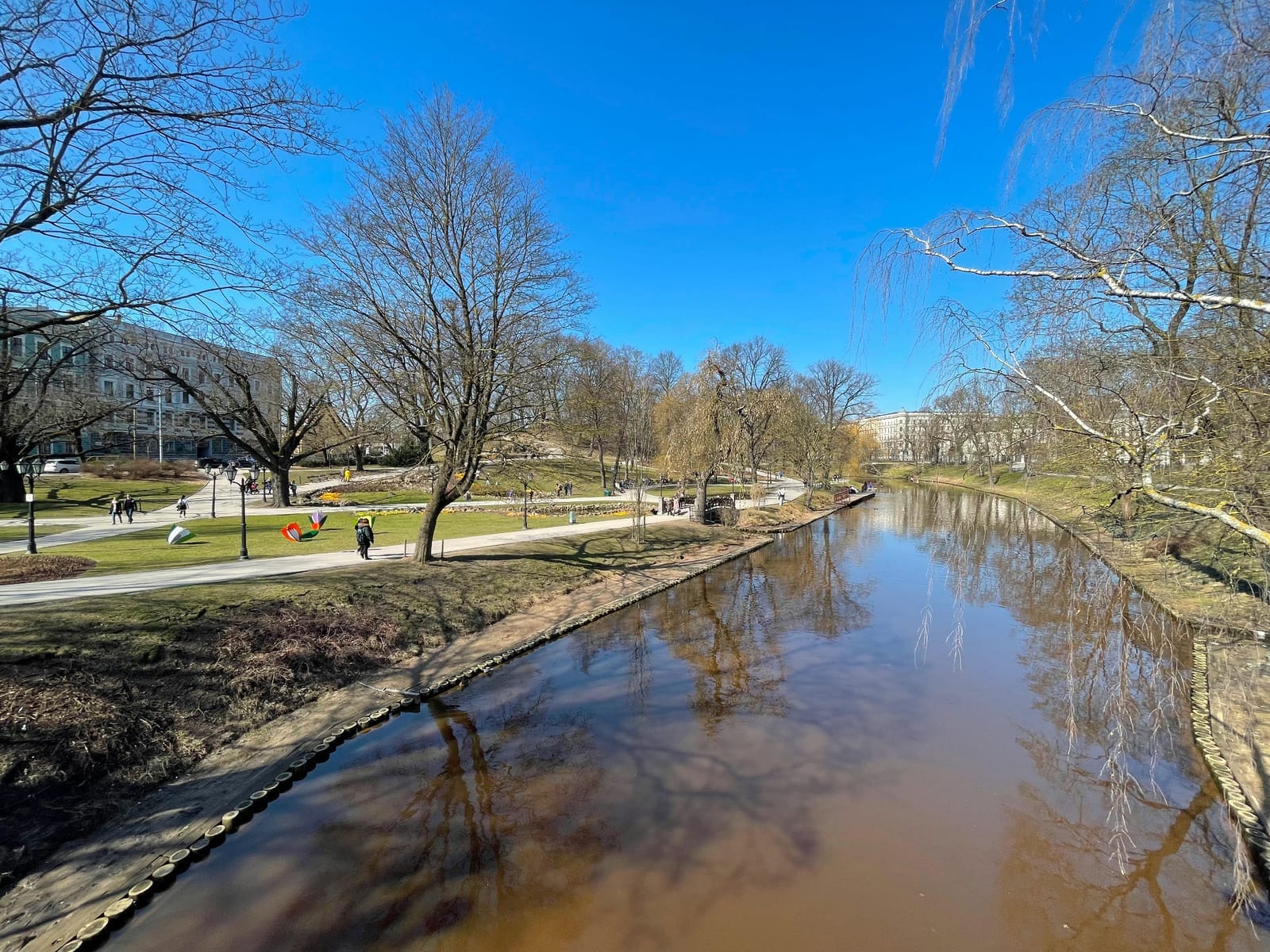 Bastejkalns park along the Riga city canal