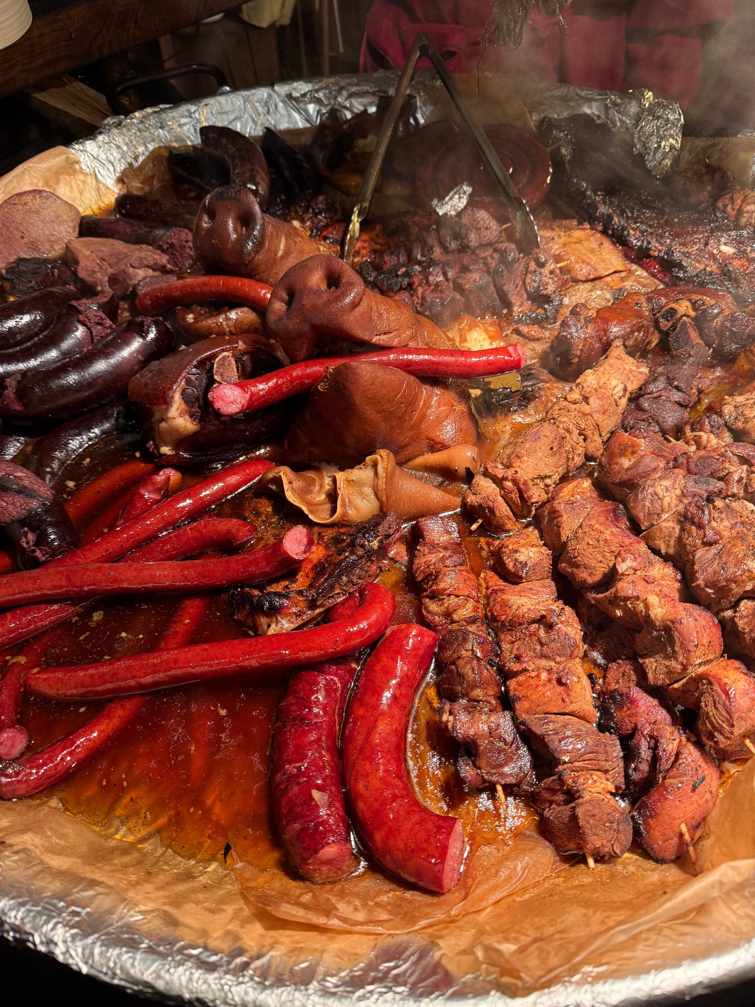 A platter of Latvian grilled meats, sausages and black pudding at the Christmas market